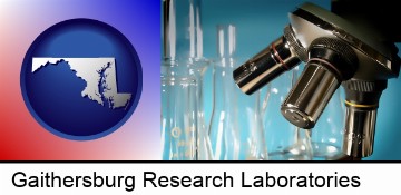 a microscope and glassware in a research laboratory in Gaithersburg, MD