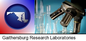 Gaithersburg, Maryland - a microscope and glassware in a research laboratory