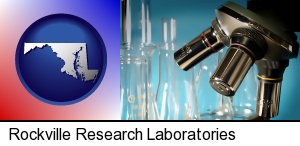 Rockville, Maryland - a microscope and glassware in a research laboratory
